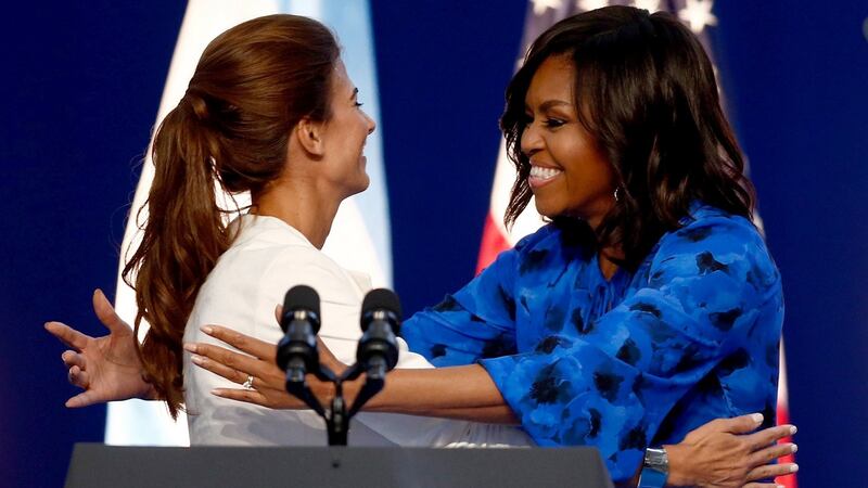 US first lady Michelle Obama  is greeted by Juliana Awada, wife of Argentina’s president Mauricio Macri, in  Buenos Aires on Wednesday. Photograph: Marcos Brindicci/Reuters