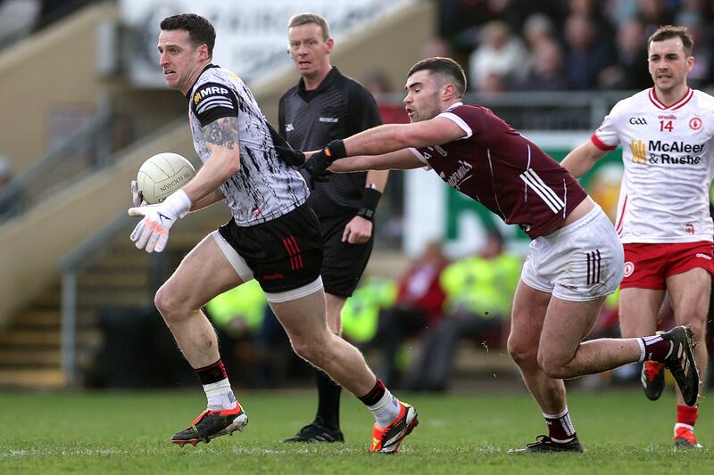 Tyrone goalkeeper Niall Morgan and Sean Mulkerrin of Galway. Wandering goalkeepers sallying upfield promises to be a more common sight this year. Photograph: Laszlo Geczo/Inpho