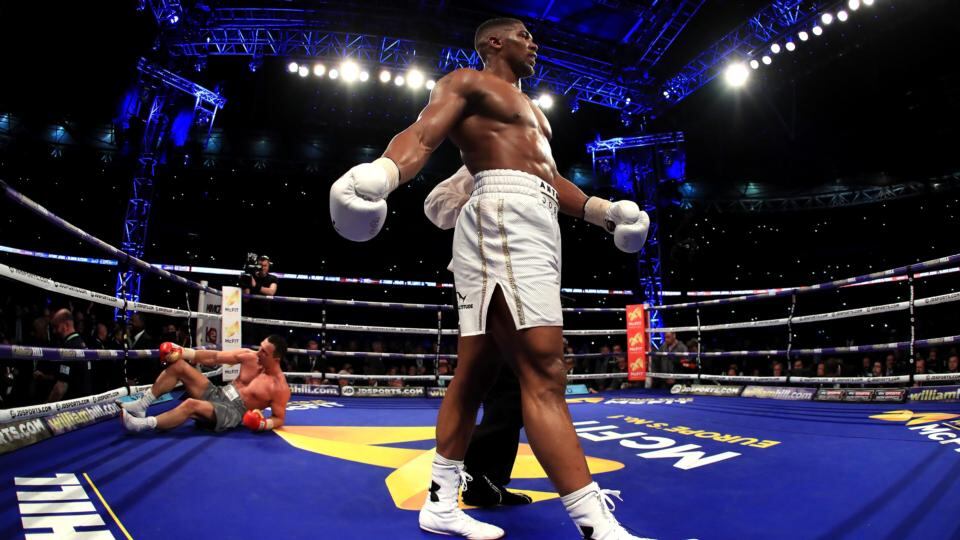 Anthony Joshua reacts after knocking down Wladimir Klitschko during the IBF, WBA and IBO Heavyweight World Title bout at Wembley Stadium in London. Photograph: Richard Heathcote/Getty Images