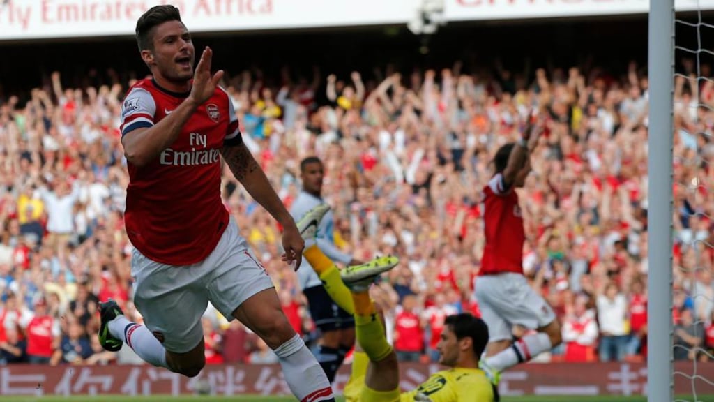 Arsenal’s Olivier Giroud celebrates scoring against Tottenham Hotspur during their Premier League soccer match at the Emirates. Photograph: Eddie Keogh/Reuters