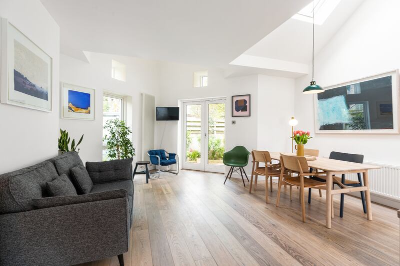 The living/dining room looking from the front to the back.