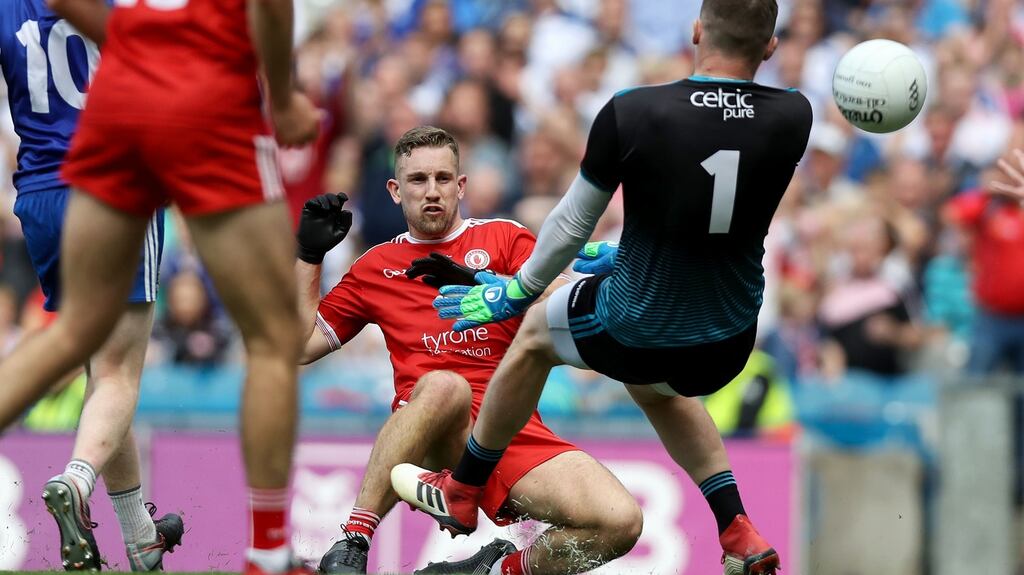 Tyrone’s Niall Sludden scores the only goal of the match. Photograph: Tommy Dickson/Inpho