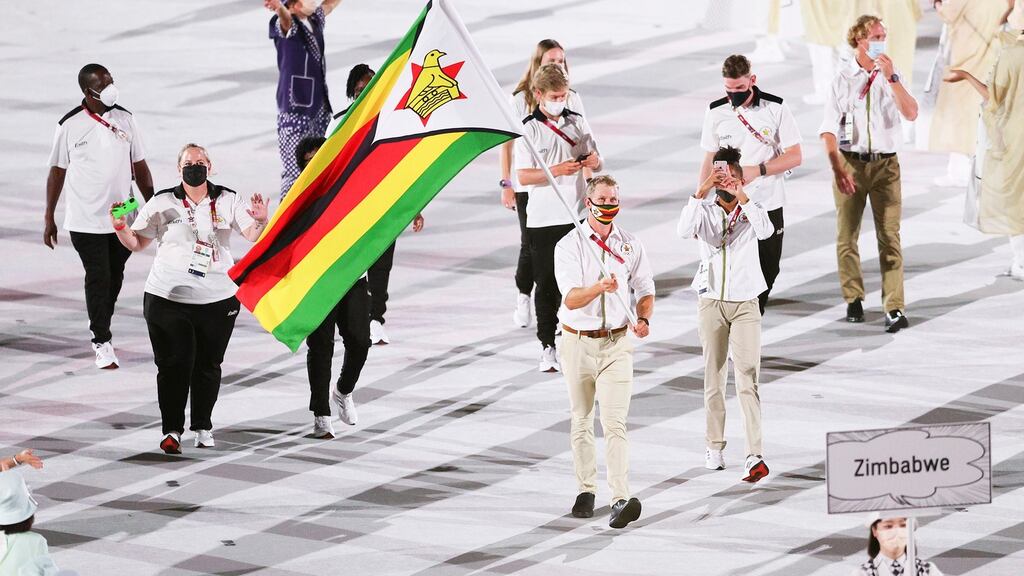 Flag bearers Donata Katai and Peter Purcell-Gilpin of Team Zimbabwe during the opening ceremony of the Tokyo Olympic Games. Photograph: Patrick Smith/Getty Images