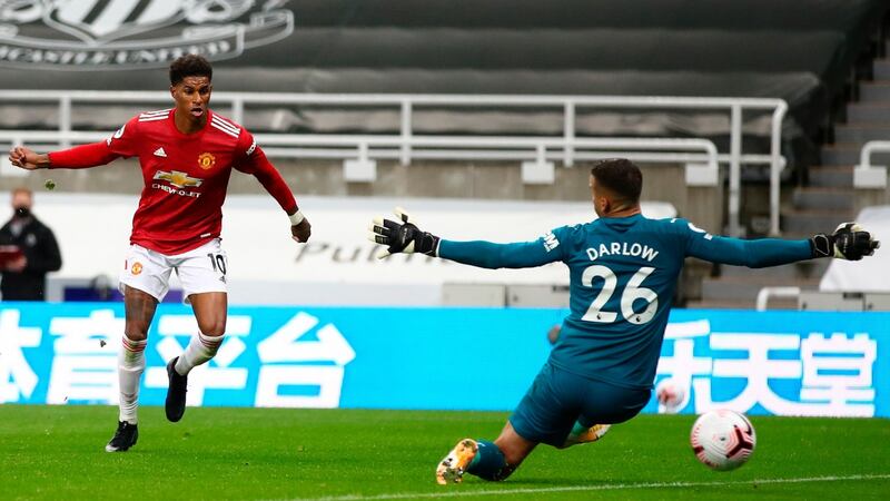 Marcus Rashford rounds off the scoring for Manchester United against Newcastle. Photograph: Alex Pantling/EPA