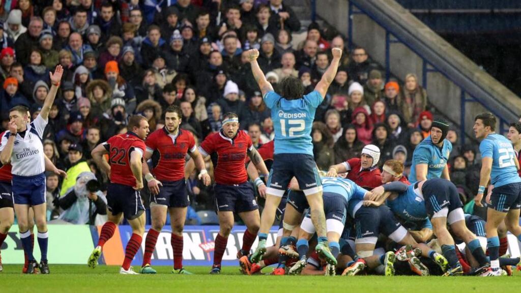 Italy’s players celebrate as Irish referee George Clancy awards them a penalty try at the end of their Six Nations game with Scotland in Murrayfield. Photograph: Morgan Treacy/Inpho