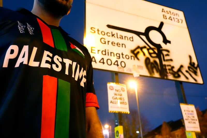 A fan in a Palestine football shirt standing outside Villa Park, Birmingham. Photograph: Nick Potts/PA Wire
RESTRICTIONS: Use subject to restrictions. Editorial use only, no commercial use without prior consent from rights holder.