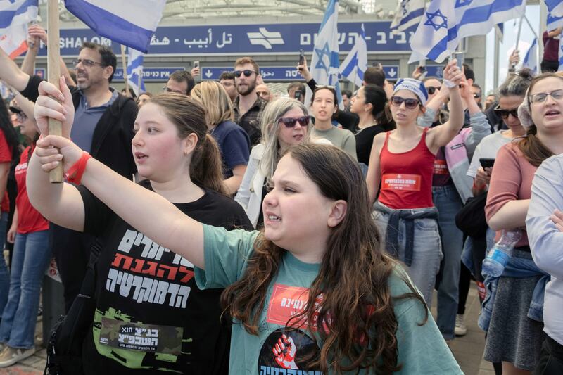 Young girls taking part in a protest in Tel Aviv  against the reforms. Photograph: Amit Elkayam/The New York Times