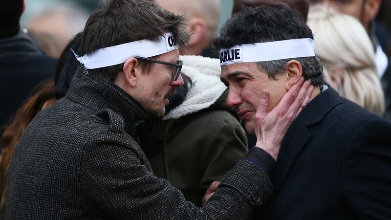 Charlie Hebdo: Patrick Pelloux, columnist and doctor (right, with the cartoonist Renald Lucier, aka Luz), treated his dying and wounded friends. For days afterwards he was on every television screen, dazed and weeping uncontrollably. Photograph: Dan Kitwood/Getty