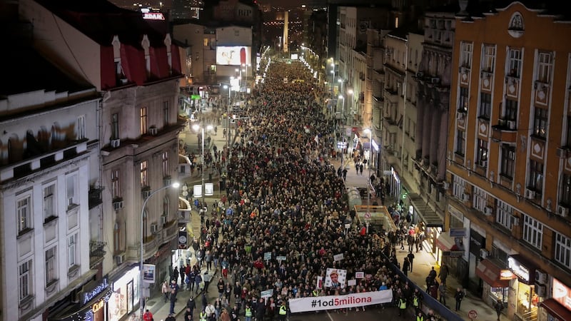 Demonstrators carry a banner, ’1 of 5 Millions’, during a protest against president Aleksandar Vucic and his government in central Belgrade, Serbia. Photograph: Marko Djurica/Reuters