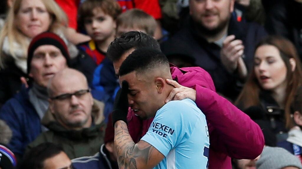 Gabriel Jesus is consoled after injuring his knee during Man City’s goalless draw with Crystal Palace. Photograph: David Klein/Getty