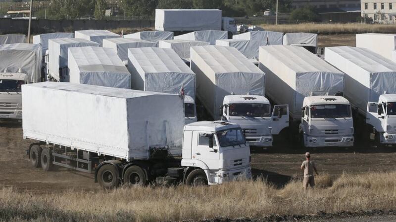 A Russian aid convoy of white trucks on the way from Kamensk-Shakhtinsky in Rostov region to a checkpoint on the Russian-Ukrainian in border. Photograph: Yuri Kochetkov/EPA.