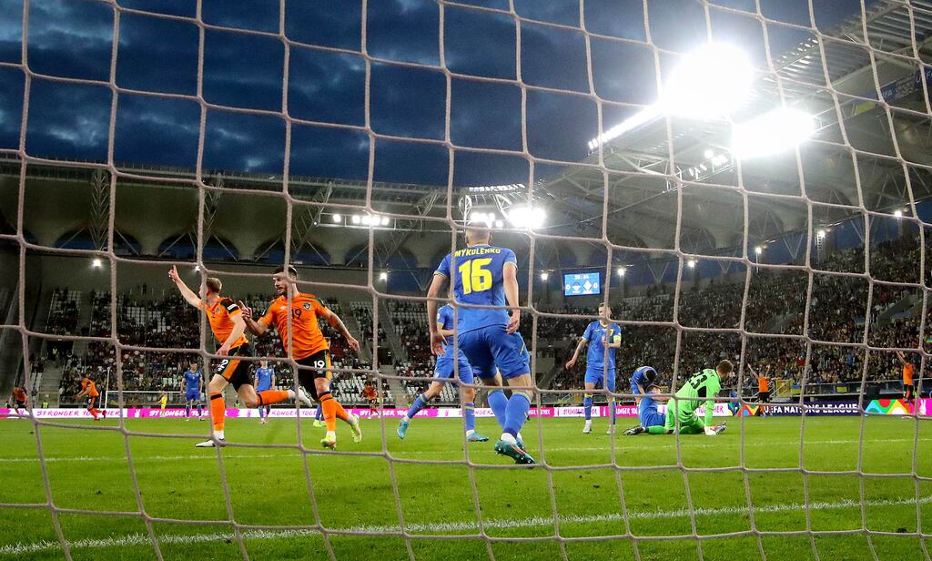 Ireland’s Nathan Collins celebrates after scoring against Ukraine at the LKS Stadium in Łódź, Poland. Photograph: Ryan Byrne/Inpho