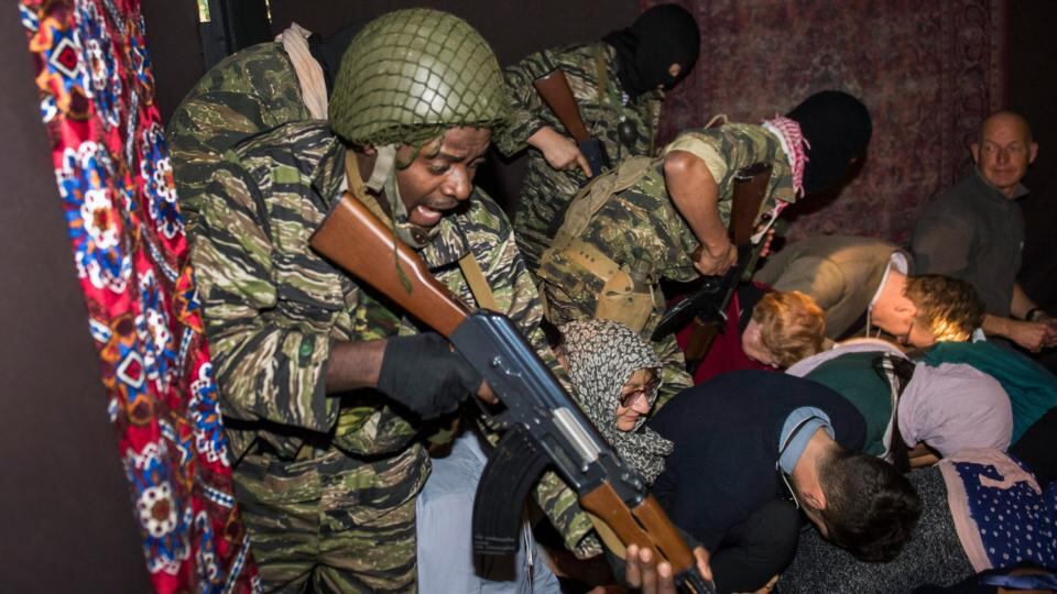 People take part in a simulation entitled ‘A Day in the Life of a Refugee: Exploring Solutions for Syria’, ahead of the opening of the 44th Annual Meeting of the World Economic Forum (WEF), in Davos, Switzerland. Photograph: Jean-Christophe Bott/EPA
