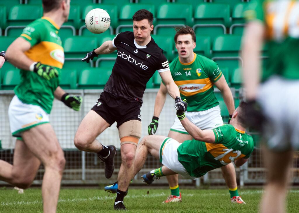 Leitrim’s Riordan O'Rourke and Sligo’s Eddie McGuinness in the Connacht senior football championship quarter-final at Páirc Sean MacDiarmada in Leitrim. Photograph:  
Evan Logans/Inpho