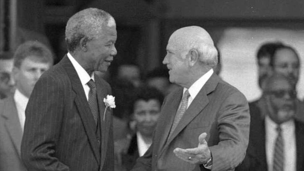 South African president Nelson Mandela exchanges a handshake with deputy president F.W. de Klerk after their inauguration in Pretoria, May 9th, 1994.Photograph: Ozier Muhammad/The New York Times.