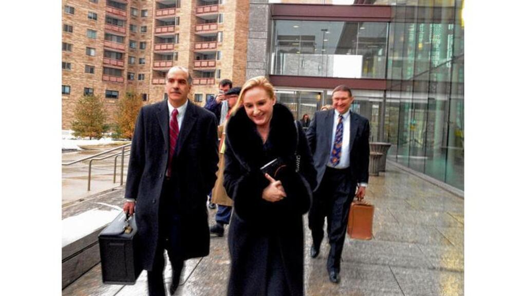 Gayle Killilea leaving court yesterday where she and her husband, Seán Dunne, are seeking information from Nama about the agency's view of Mr Dunne's business plan