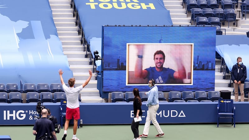 Germaby’s Alexander Zverev celebrates after with his brother Mischa after his first round win. Photograph: Al Bello/Getty