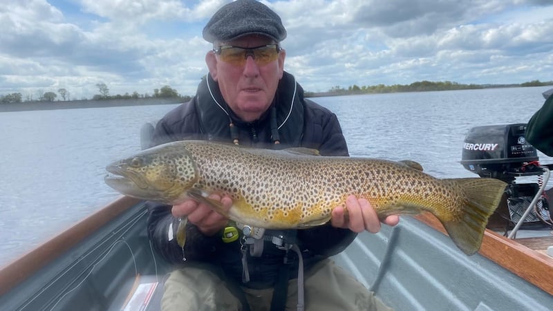 Pat Gallagher proudly displays his 10lb (70cm) brown trout from Lough Sheelin.