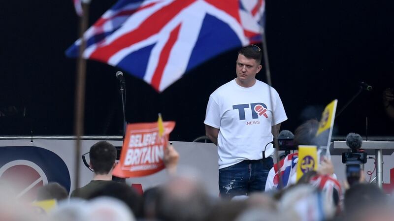 Far-right leader Tommy Robinson speaks on stage during a Brexit supporters’ rally. Photograph: Neil Hall/EPA