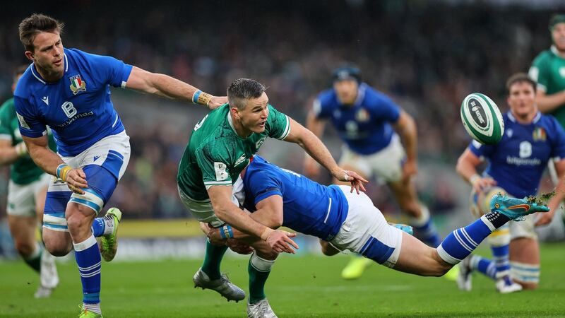 Johnny Sexton not shirking a tackle from Italy's Paolo Garbisi during a Six Nations match at the Aviva Stadium. Photograph: James Crombie/Inpho