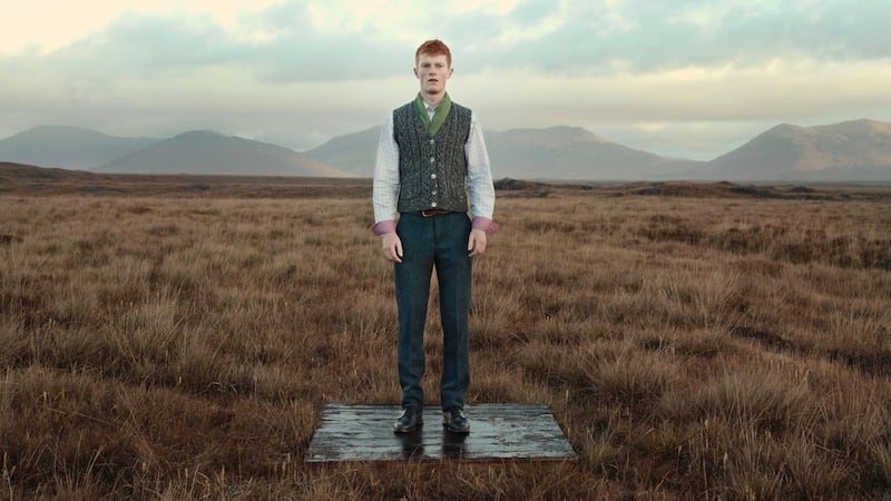 Sean Nós dancer Ryan Owens wearing a waistcoat by Bonner, gilet by De Bruir, Ireland’s Eye Aran knit, Celtic tweed trousers and scarf by Aine. Film still: Perry Ogden/Showcase