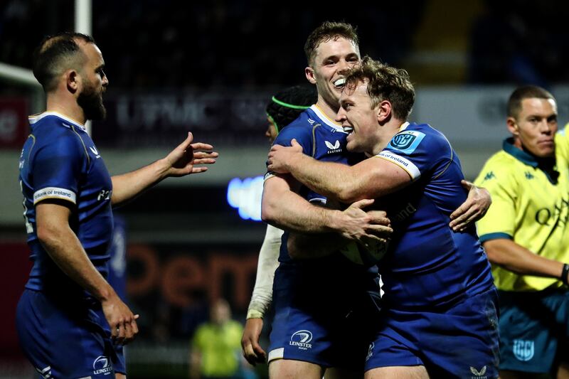 Leinster’s Liam Turner celebrates scoring their seventh try with Rob Russell and Jamison Gibson-Park in 2024. Photograph: Ben Brady/Inpho