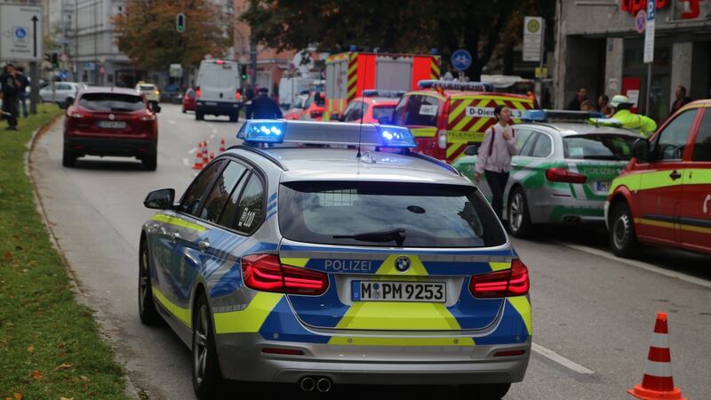 German police officers are seen at the crime scene where a man injured several people. Photograph: EPA
