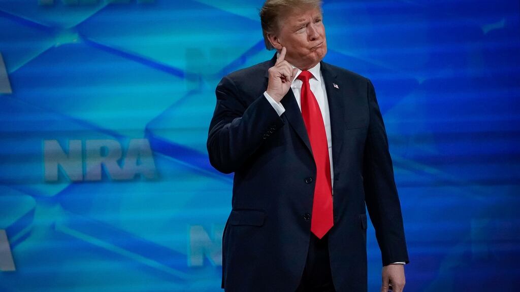 US president Donald Trump gestures as he walks on stage before addressing the annual National Rifle Association  convention in Indianapolis. Photograph: Reuters