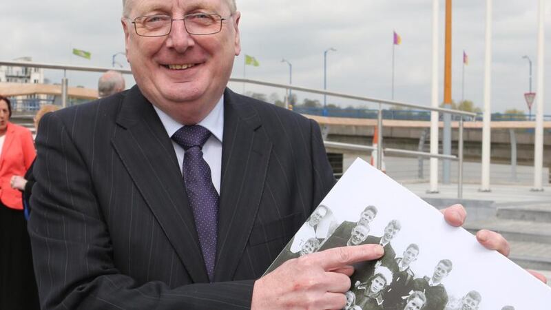 Victor Furness points himself out (back row, second from left) in a photograph of New Ross choir members taken before they travelled to the US in 1964 to sing on The Ed Sullivsan Show. photograph: Mary Browne
