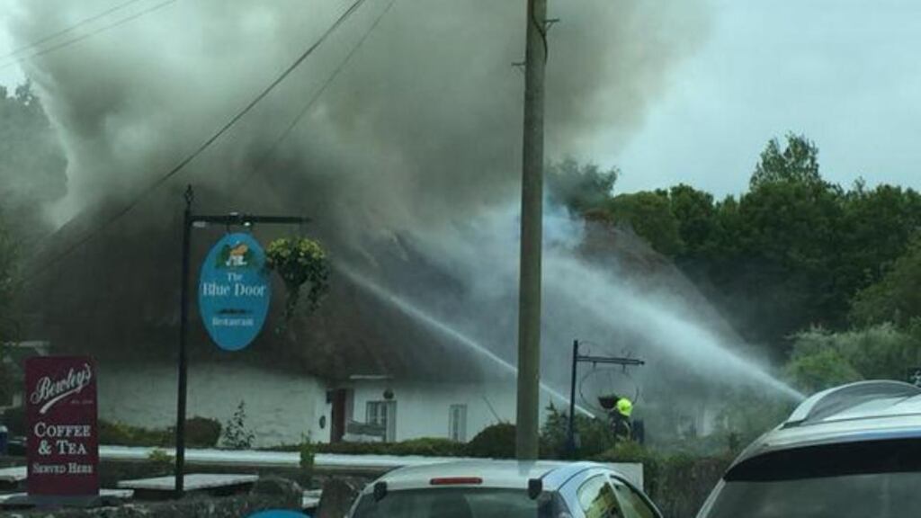Adare village was closed for most of Saturday as six fire crews from Limerick County accompanied by additional crew from the city, battled the fire for several hours. Photograph: Barry O’Halloran