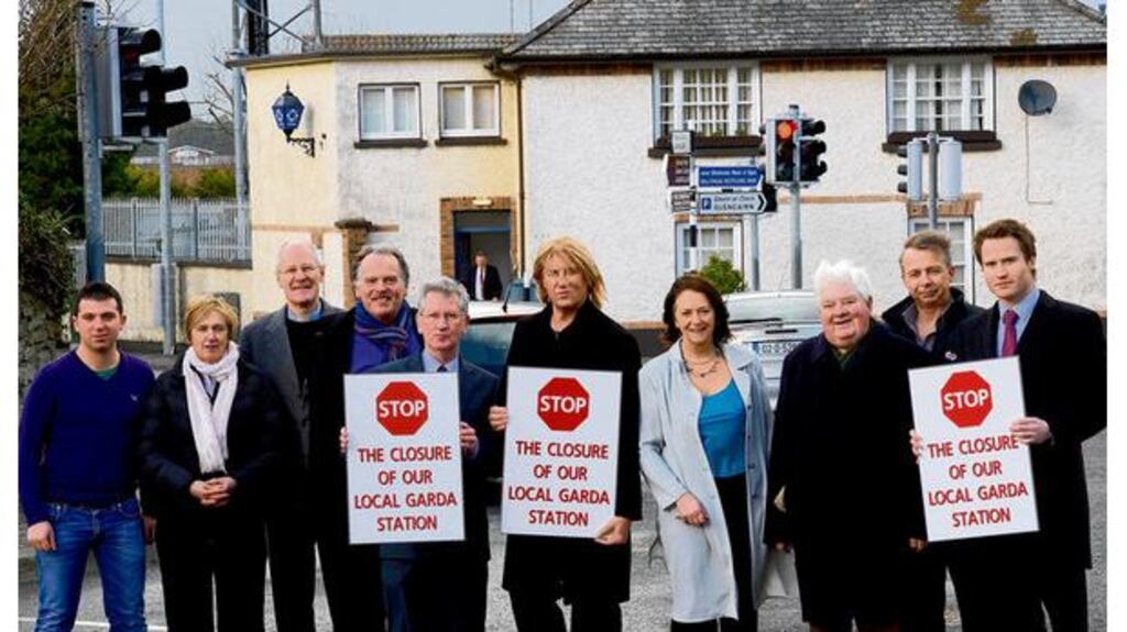 Stepaside residents and traders oppose the closure of the local Garda station. From left, Paolo Borza; Jean Dermody; Canon David Moynan; Frank Mulvey, Des Kennedy; Def Leppard singer Joe Elliott; Cllr Lettie McCarthy; peace commissioner Bob Gahan; John McCluskey; and Joseph Lee. photograph: cyril byrne