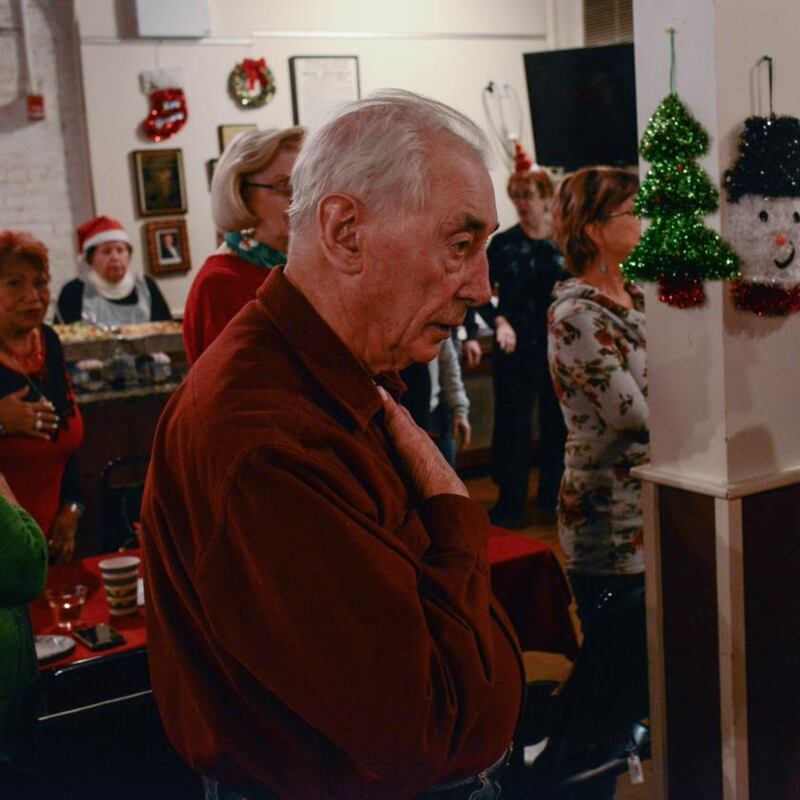 Tommy Ring pledges the oath of allegiance at the New York Irish Center’s annual Christmas lunch. Photograph: Lauren Crothers
