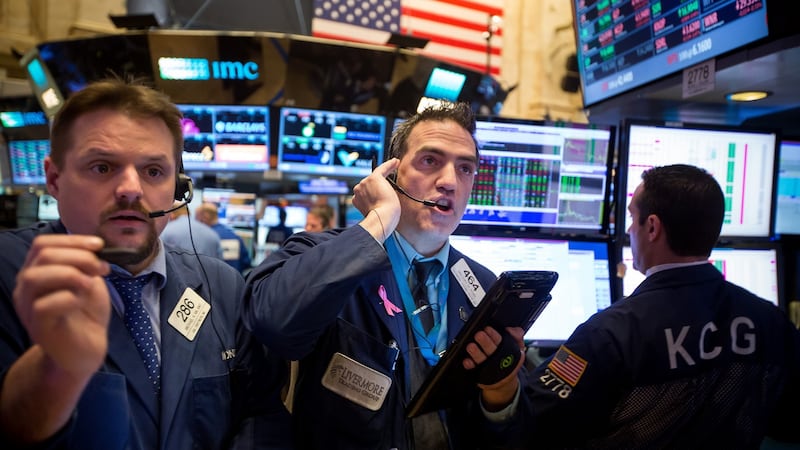 Traders work on the floor of the New York Stock Exchange. Photograph: Michael Nagle/Bloomberg