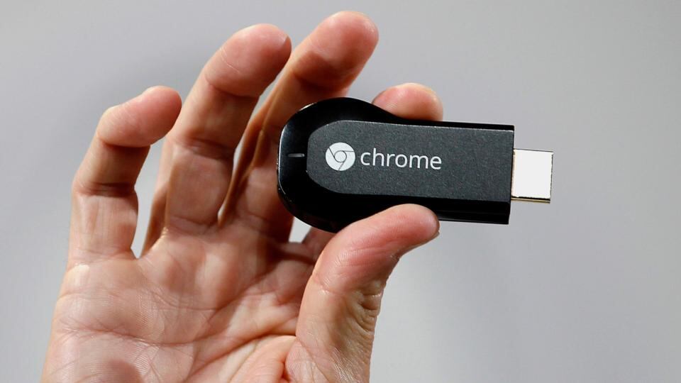 Mario Queiroz, vice-president of product management for Google, displays the new Google ChromeCast while speaking at an event in San Francisco, California, uesterday. Photograph: Tony Avelar/Bloomberg