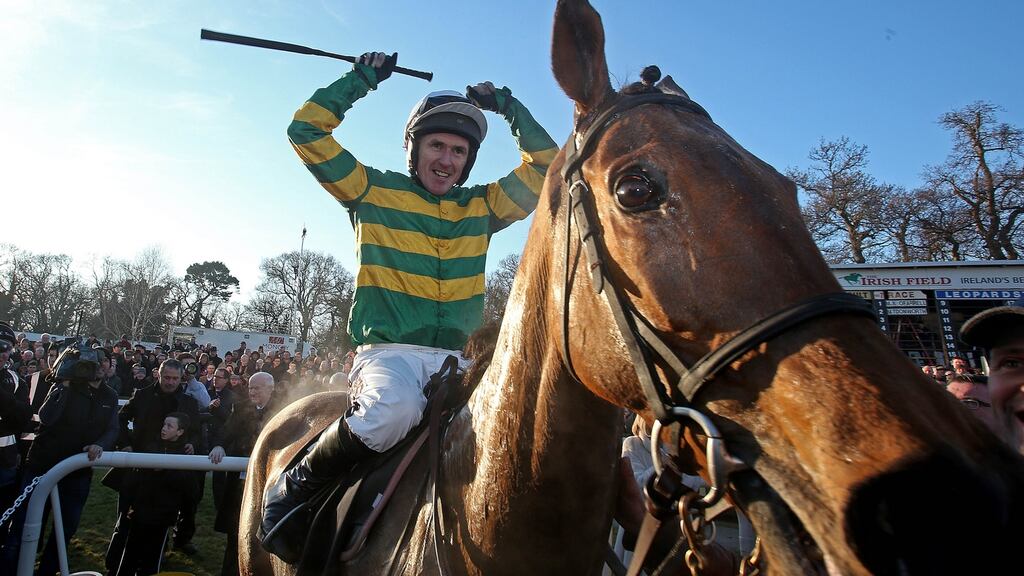 Tony McCoy celebrates winning the Gold Cup onboard Carlingford Lough at Leopardstown in 2015. Photograph: Donall Farmer/Inpho