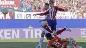Torres nets again as Atletico increase pressure on Barcelona