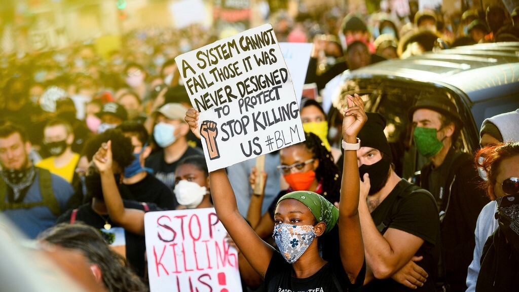 Demonstrators gather in Oakland, California on Monday to protest the death of George Floyd, who died after being restrained by Minneapolis police officers on May 25th. Photograph: Noah Berger/AP Photo