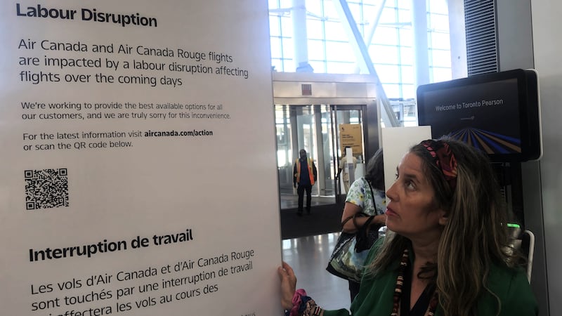 Passenger Miren McDonald at Pearson Airport in Toronto where a strike by Air Canada crew has brought many flights to a halt.