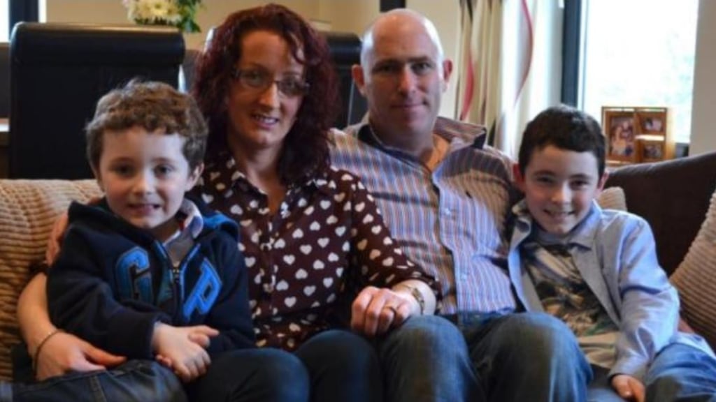Adrian Gallagher with  his wife Emer and sons Cian (6) Luke (10). ‘It is a lot to leave behind: my wife, kids, house and the life I’ve built up.’
