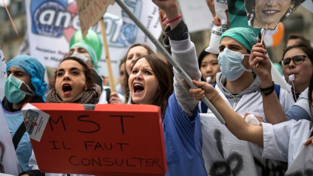 Hospital personnel and medical students protest French government reform which seeks to modify payment and social security reimbursement methods for consultations. Photograph: EPA/Ian Langsdon.