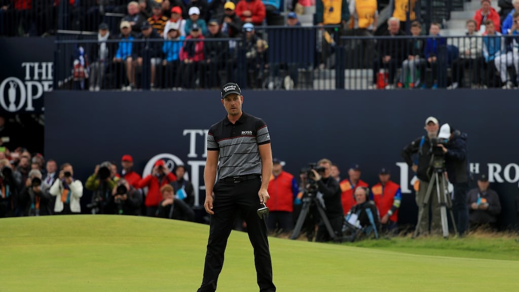 The Iceman - Henrik Stenson of Sweden celebrates victory after the winning putt on the 18th green at Royal Troon. Photograph: Mike Ehrmann/Getty Images