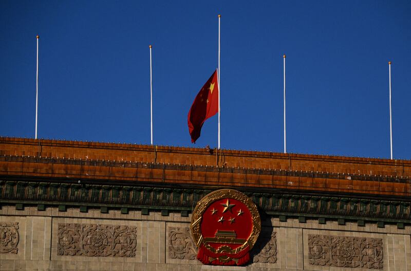 The Chinese national flag flies at half-mast in tribute to former Chinese leader Jiang Zemin at the Great Hall of the People in Beijing. Photograph: Noel Celis/AFP via Getty Images