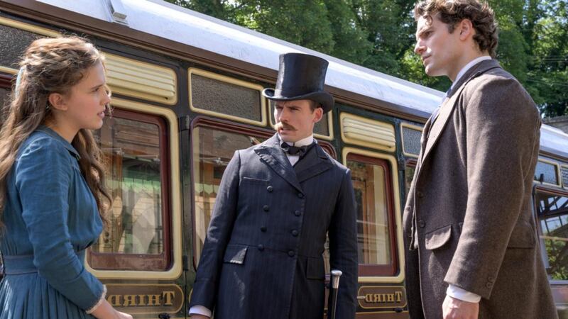 Millie Bobby Brown, Sam Claflin and Henry Cavill as Enola, Mycroft and Sherlock Holmes