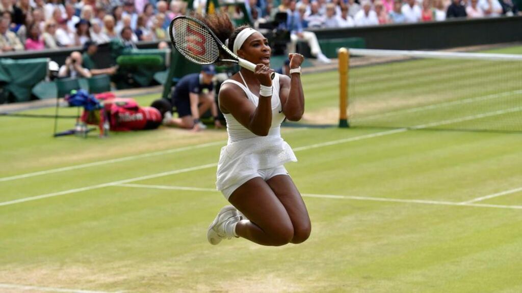 Serena Williams of the U.S.A. celebrates after winning her match against Victoria Azarenka of Belarus at the Wimbledon Tennis Championships. Photo: Toby Melville/Reuters