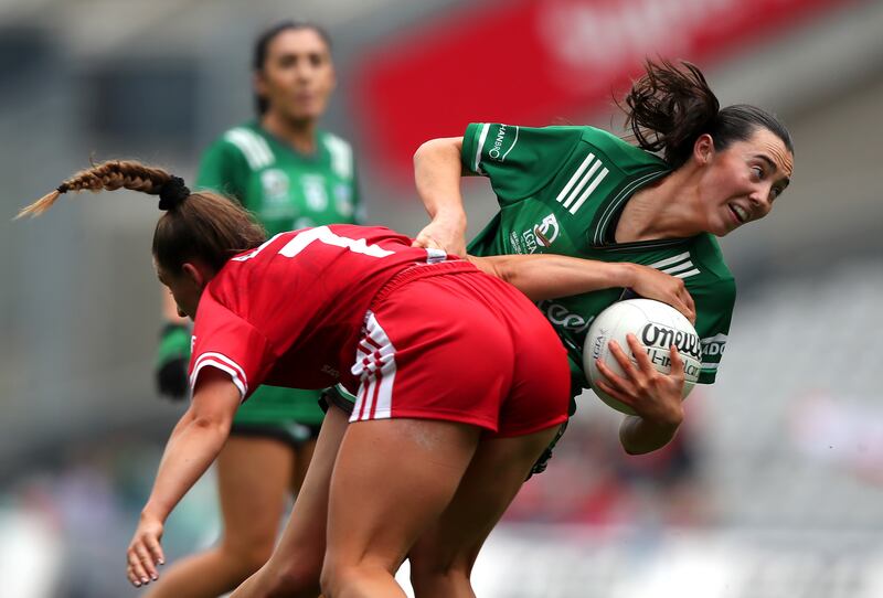 Louth's Ceire Nolan tackles Blaithin Bogue of Fermanagh at Croke Park. Photograph: Leah Scholes/Inpho