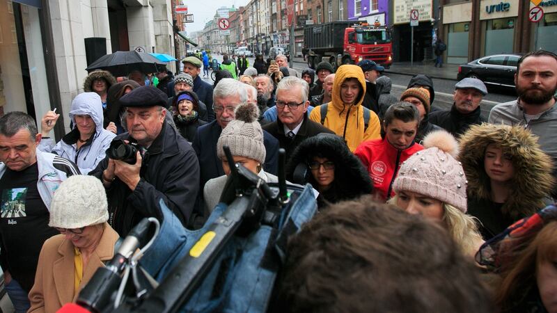 Crowds during a plaque unveiling ceremony to commemorate 55 years since The Beatles performed their only two concerts at the old Adelphi cinema on Middle Abbey Street, Dublin. Photograph: Gareth Chaney Collins