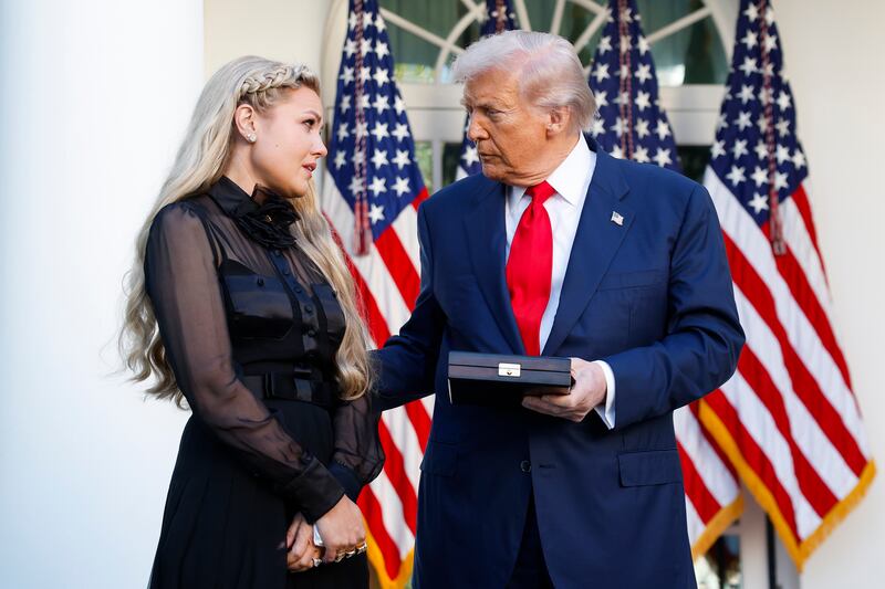 President Donald Trump posthumously awards the Presidential Medal of Freedom to late conservative activist Charlie Kirk as he presents the medal to Erika Kirk in the Rose Garden of the White House. Photograph: Kevin Dietsch/Getty Images