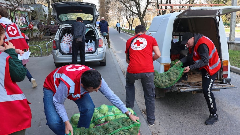 Ukrainians work in a Red Cross volunteer centre in Kharkiv, Ukraine: the Irish arm of the international charity has sent €5.2 million in donated funds to Red Cross branches working in the conflict zone and neighbouring countries. Photograph: Sergey Kozlov/EPA
