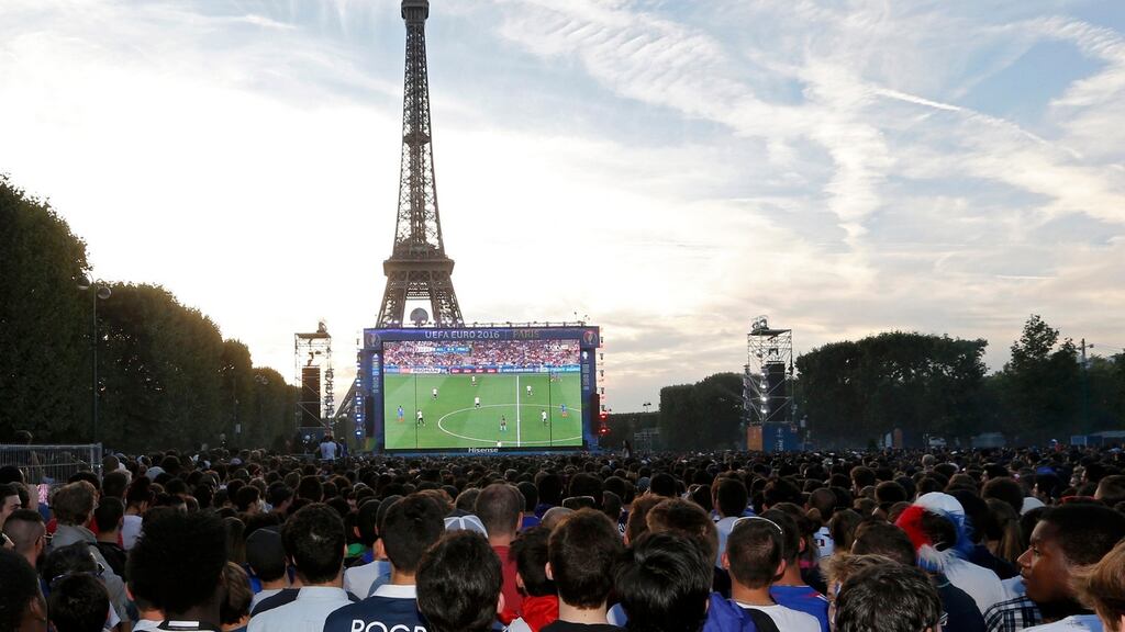 The fan zone in Paris early in the evening before Antoine Griezmann’s two goals saw France through to Sunday’s European Championship final. Photograph: Regis Duvignau/Reuters