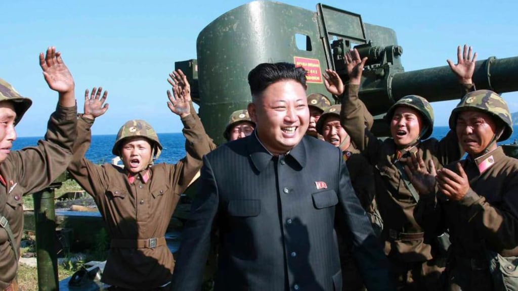 An undated picture released by the North Korean Central News Agency (KCNA) from July 2014 showing North Korean leader Kim Jong-un (centre) surrounded by soldiers as he tours a front-line military detachment in the East Sea, North Korea.